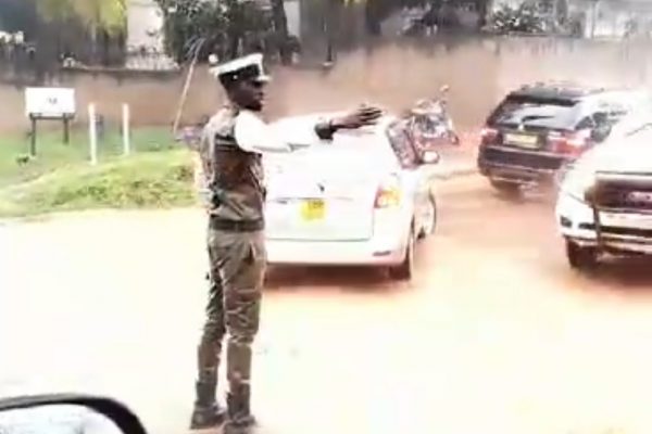 Traffic officer in the rain. Bravery or lack of preparedness? Traffic officer in the rain. Bravery or lack of preparedness?